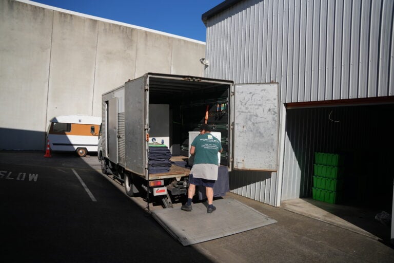 Auckland house movers carrying furniture on moving day